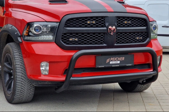 Zoomed image of a black bullbar fitted to a red Dodge Ram