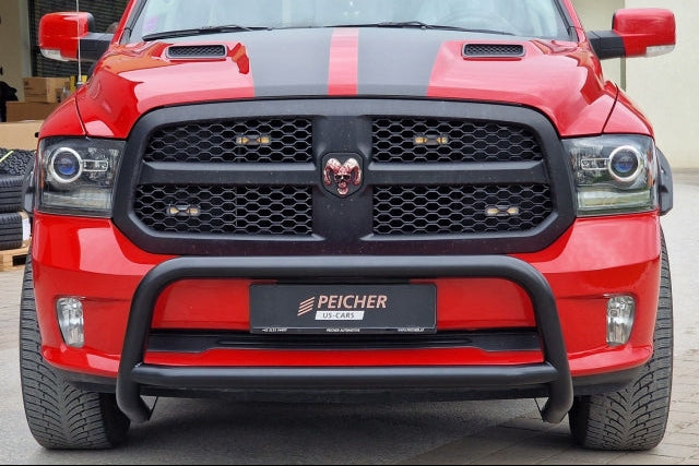 Frontal view of a black bullbar fitted to a red Dodge Ram with racing stripes