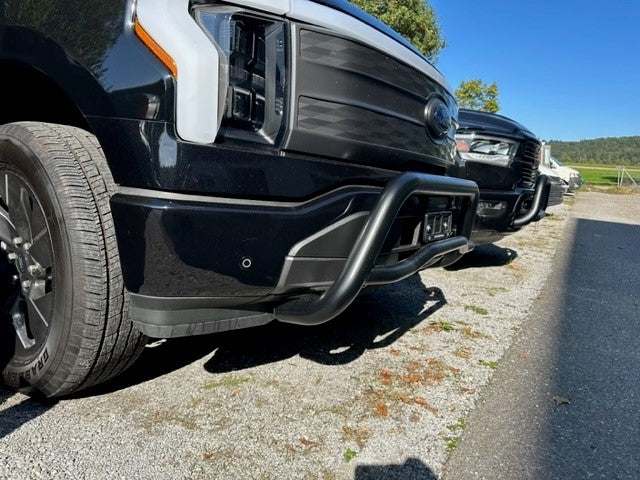 Side view of a black bullbar fitted to a Ford F150 lightning