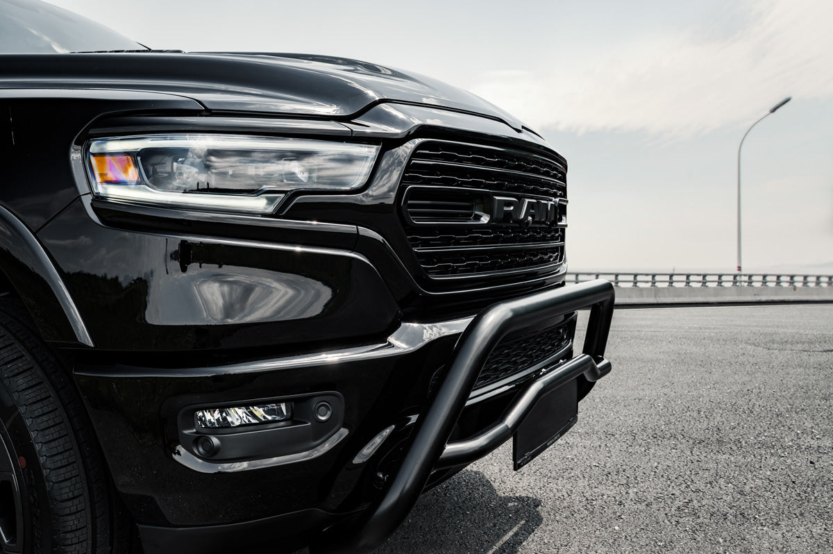 Front view of a black Dodge Ram with a black bullbar fitted