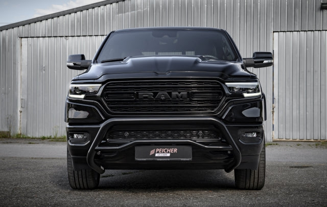 Frontal view of a black Dodge Ram with a black bullbar