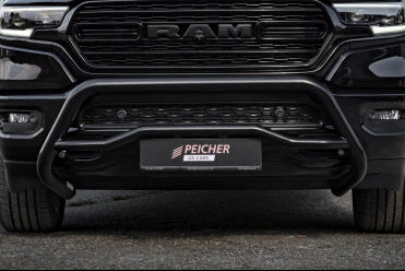 Closeup of a black Dodge Ram truck with a black bullbar installed