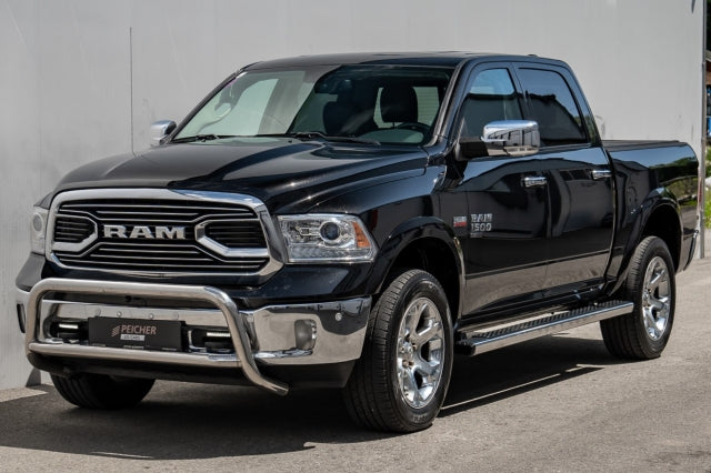 Black Dodge Ram Classic with a stainless steel ullbar