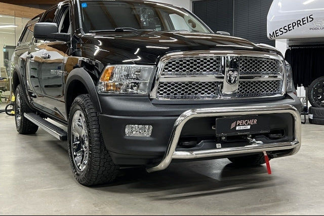 Black Dodge Ram showcasing a stainless steel bullbar