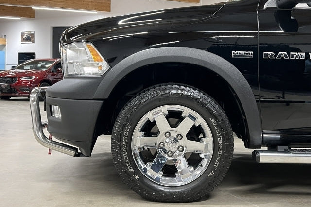 Side view of a 2008-2019 Dodge Ram  with a stainless steel bullbar