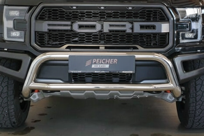 Closeup of a stainless steel bullbar fitted to a Ford F150 Raptor