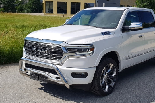 White Dodge Ram with a stainless steel bullbar