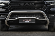 Close-up of a Dodge Ram truck with a stainless steel bullbar on a dark background